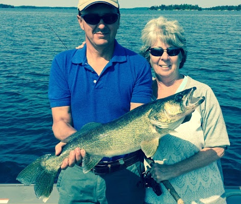Mark Belanger and Linda Cortez with walleye